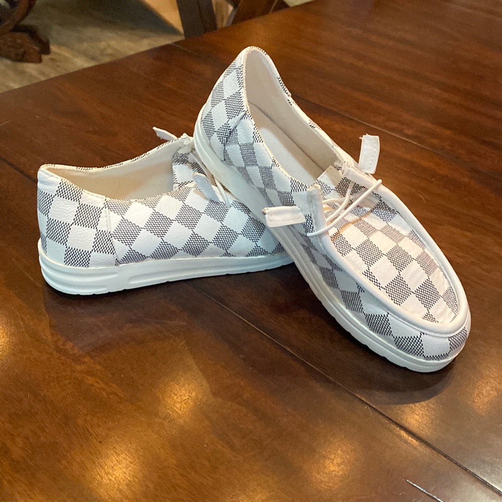 Checkered shoes.